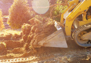 Bobcat moving soil for earthmoving services in Ballarat.