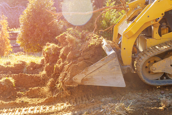 Bobcat moving soil for earthmoving services in Ballarat.